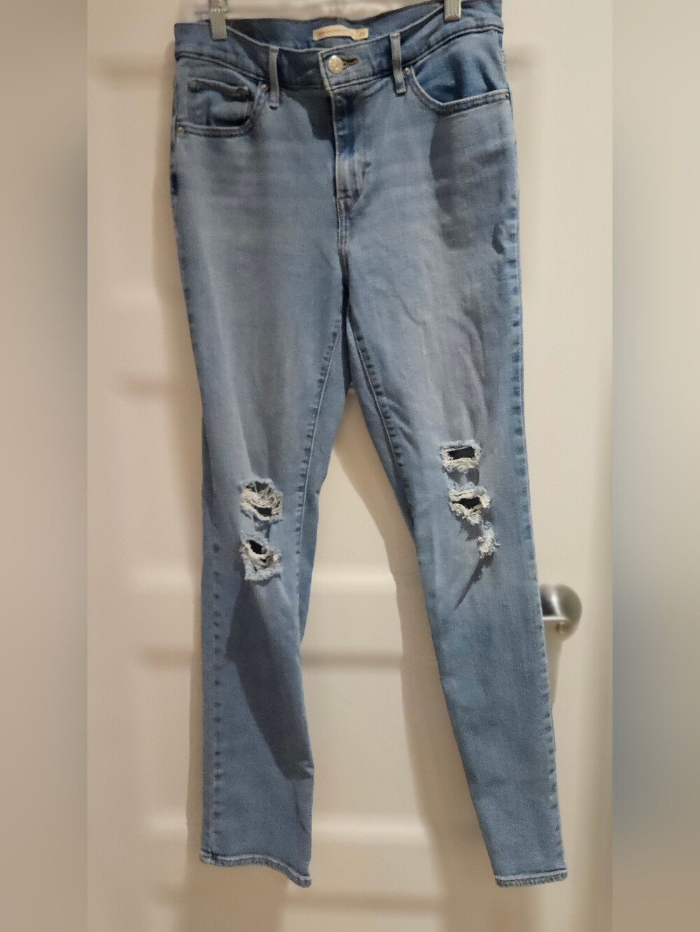 Levi's light blue distressed skinny jeans